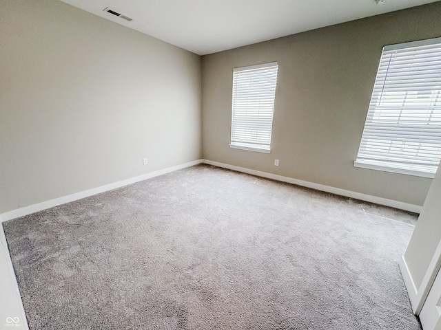 3522 Brampton Ln, Westfield, IN 46074 - empty room with healthy amount of natural light and carpet