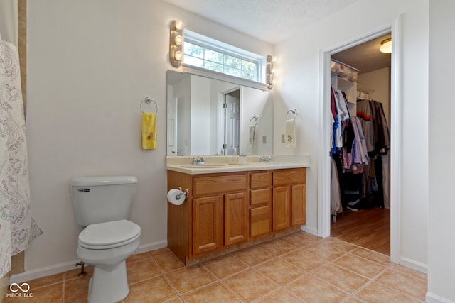 5034 Aspen Crest Ln, Indianapolis, IN 46254 - bathroom featuring double vanity and tile patterned floors