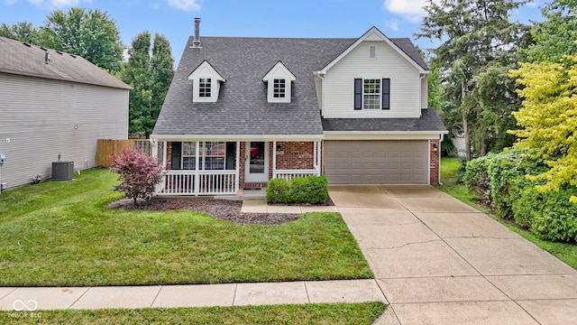 5034 Aspen Crest Ln, Indianapolis, IN 46254 - view of front of home with covered porch, brick siding, an attached garage, concrete driveway, and roof with shingles