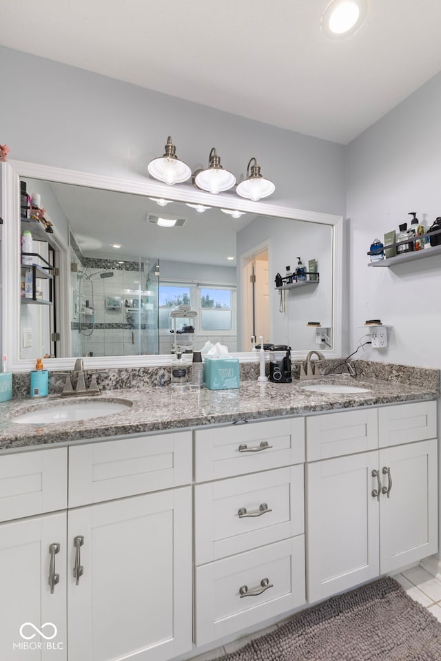 10532 Beacon Ln, Indianapolis, IN 46256 - bathroom with a stall shower, double vanity, and tile patterned floors