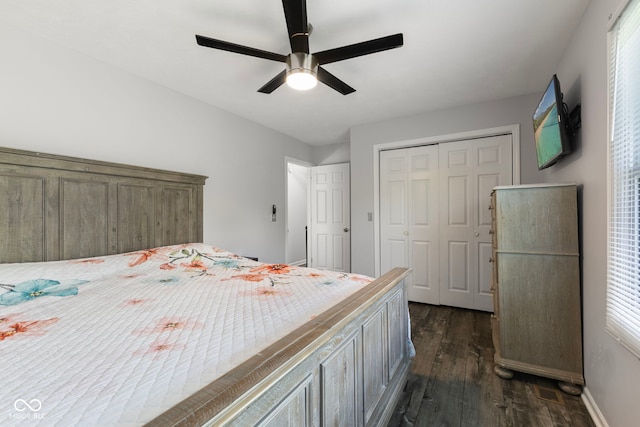 10532 Beacon Ln, Indianapolis, IN 46256 - bedroom featuring dark wood-style flooring, a closet, and a ceiling fan