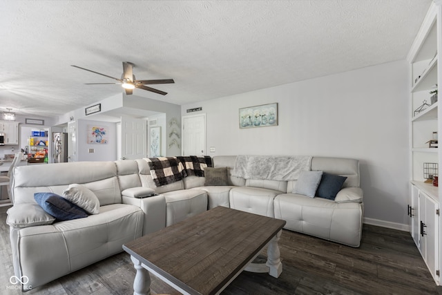 10532 Beacon Ln, Indianapolis, IN 46256 - living room featuring ceiling fan, dark wood-style floors, and a textured ceiling