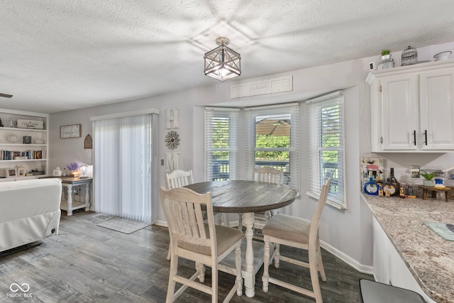 10532 Beacon Ln, Indianapolis, IN 46256 - dining space with a textured ceiling and wood finished floors
