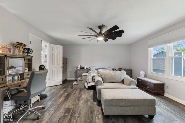 10532 Beacon Ln, Indianapolis, IN 46256 - bedroom featuring dark wood-style flooring, a ceiling fan, and an office area