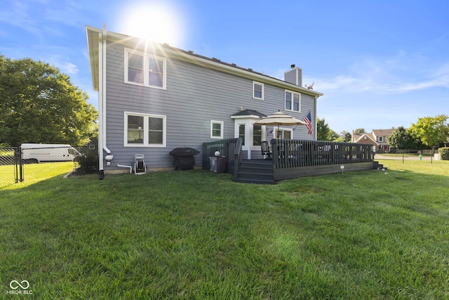10532 Beacon Ln, Indianapolis, IN 46256 - rear view of house featuring a chimney and a deck