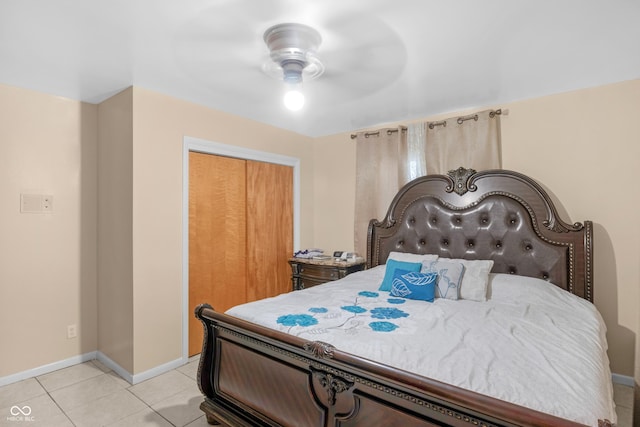 157 E Hill Valley Dr, Indianapolis, IN 46227 - bedroom featuring a closet, light tile patterned flooring, and a ceiling fan