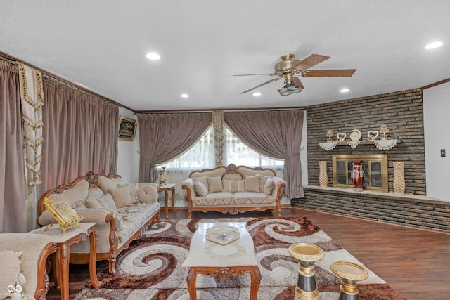 157 E Hill Valley Dr, Indianapolis, IN 46227 - living area with ceiling fan, wood finished floors, recessed lighting, and a brick fireplace