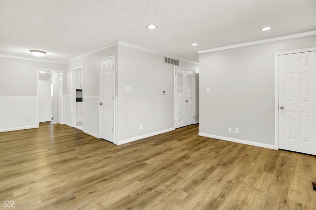 1065 Chevy Chase Ln, Carmel, IN 46280 - unfurnished room featuring ornamental molding, light wood-type flooring, and recessed lighting