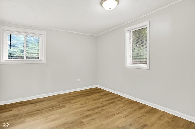 1065 Chevy Chase Ln, Carmel, IN 46280 - empty room with light wood-type flooring and ornamental molding