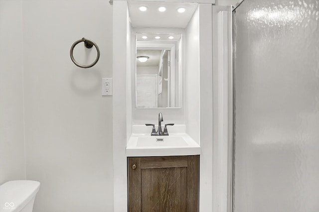 1065 Chevy Chase Ln, Carmel, IN 46280 - bathroom with vanity, recessed lighting, and a shower with door