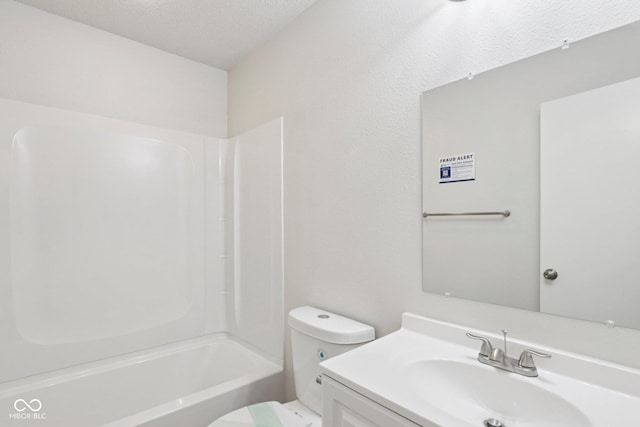2629 Redland Ln, Indianapolis, IN 46217 - full bath with vanity, tub / shower combination, and a textured ceiling