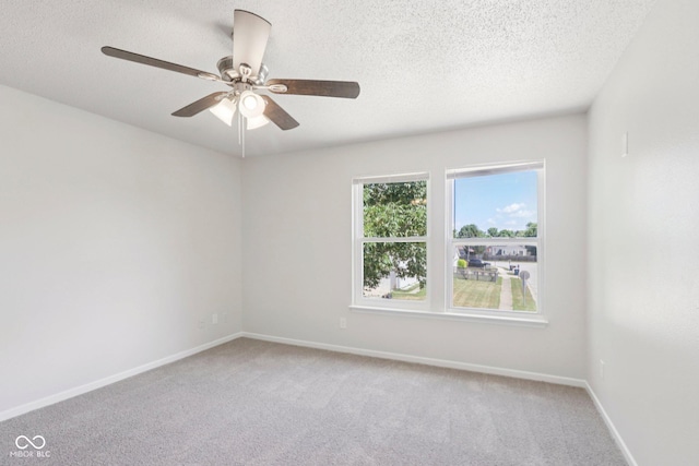 2629 Redland Ln, Indianapolis, IN 46217 - empty room with light colored carpet, a textured ceiling, and ceiling fan