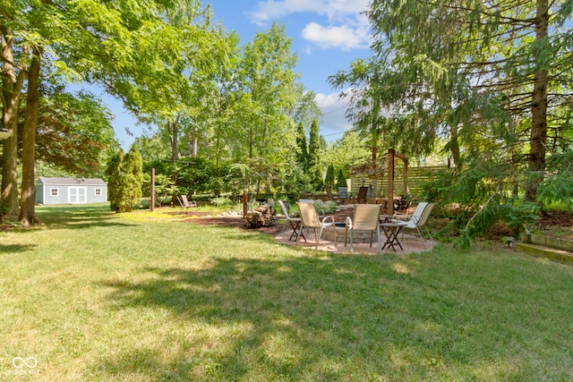 812 Eaglewood Dr, Zionsville, IN 46077 - view of grassy yard with a patio and an outdoor structure