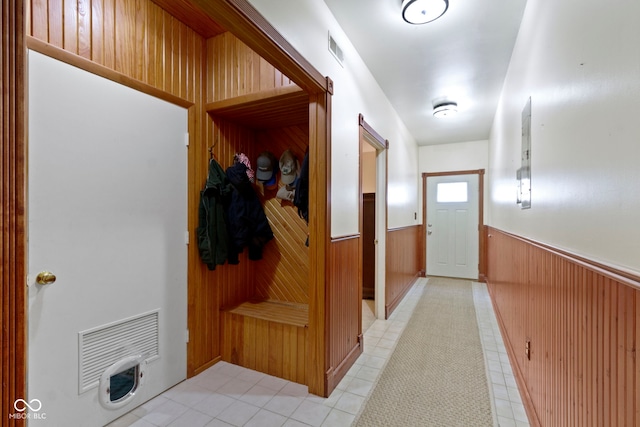 812 Eaglewood Dr, Zionsville, IN 46077 - mudroom featuring a wainscoted wall and wooden walls