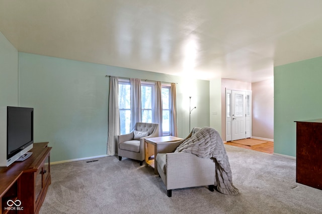 812 Eaglewood Dr, Zionsville, IN 46077 - carpeted living area featuring baseboards