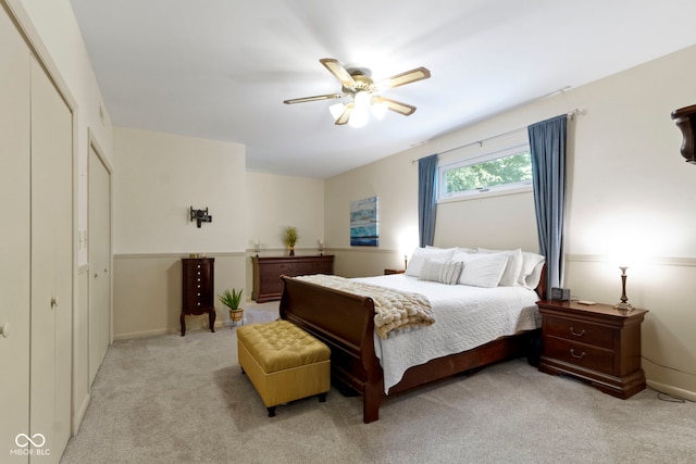 812 Eaglewood Dr, Zionsville, IN 46077 - bedroom with light colored carpet, a ceiling fan, and a closet
