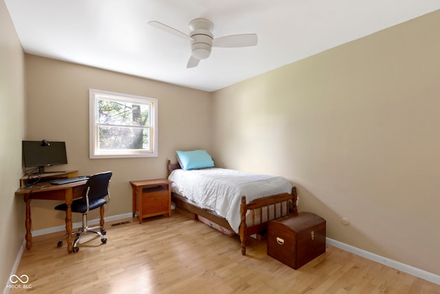 812 Eaglewood Dr, Zionsville, IN 46077 - bedroom with light wood-style floors, a desk, and ceiling fan