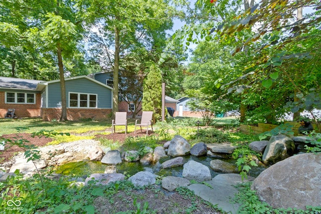 812 Eaglewood Dr, Zionsville, IN 46077 - view of yard featuring a small pond