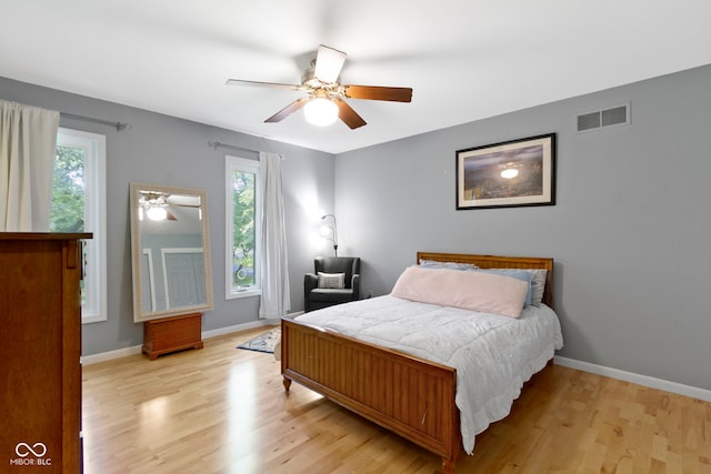 812 Eaglewood Dr, Zionsville, IN 46077 - bedroom with light wood-type flooring and ceiling fan