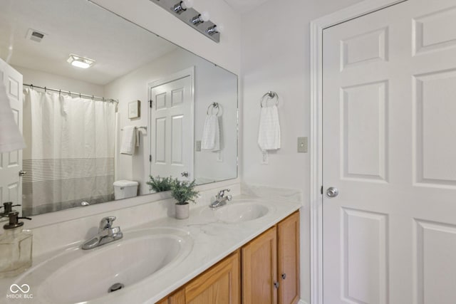 1272 Townsend Dr, Greenwood, IN 46143 - bathroom featuring double vanity and a shower with shower curtain