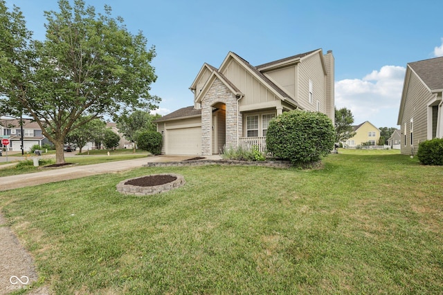 1272 Townsend Dr, Greenwood, IN 46143 - view of front facade with stone siding, an attached garage, driveway, a front yard, and board and batten siding