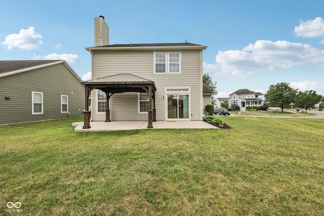 1272 Townsend Dr, Greenwood, IN 46143 - back of property with a patio area, a gazebo, a chimney, and a yard