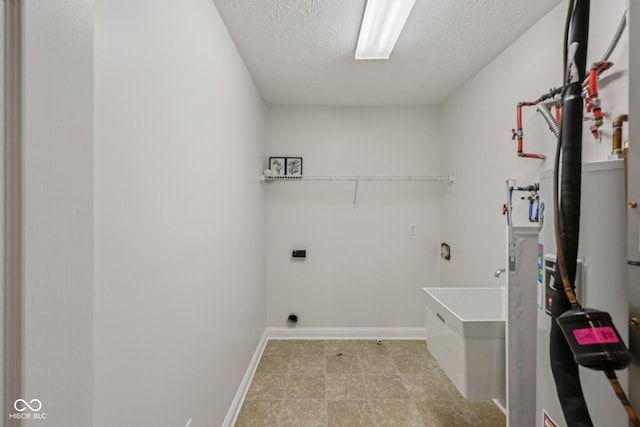 1272 Townsend Dr, Greenwood, IN 46143 - laundry room featuring electric dryer hookup and a textured ceiling