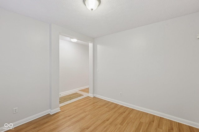 1272 Townsend Dr, Greenwood, IN 46143 - empty room with light wood-type flooring and baseboards