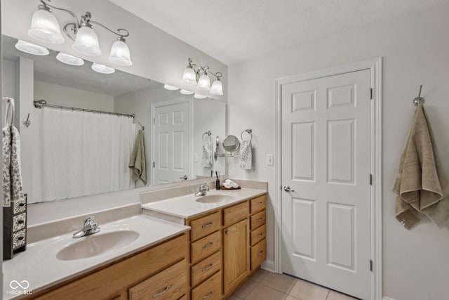 1272 Townsend Dr, Greenwood, IN 46143 - bathroom with double vanity and tile patterned floors