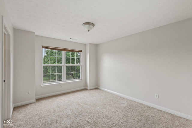 1272 Townsend Dr, Greenwood, IN 46143 - unfurnished room with carpet flooring and a textured ceiling