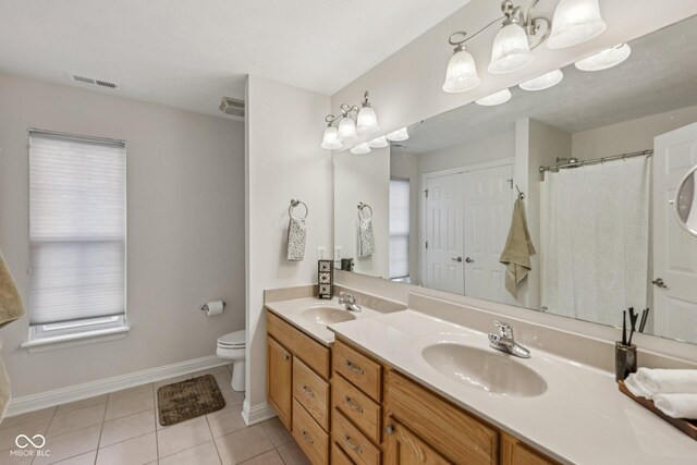 1272 Townsend Dr, Greenwood, IN 46143 - bathroom with double vanity, tile patterned flooring, and a shower with curtain