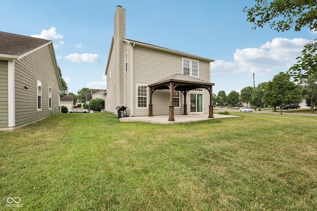 1272 Townsend Dr, Greenwood, IN 46143 - back of property featuring a gazebo, a chimney, a patio, and a lawn