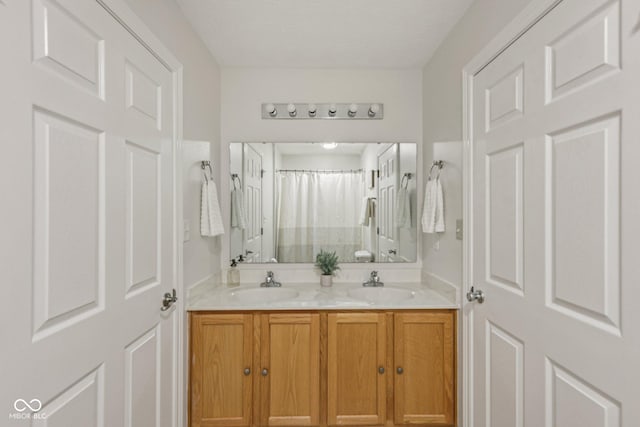 1272 Townsend Dr, Greenwood, IN 46143 - full bathroom with double vanity and a shower with curtain