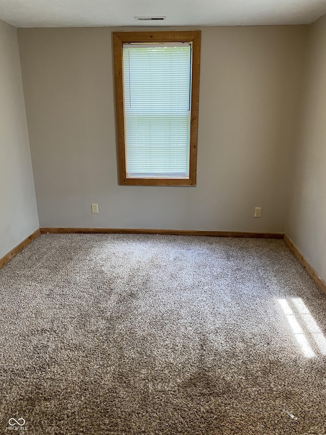 3170 Sapphire Blvd, Indianapolis, IN 46268 - carpeted empty room with baseboards