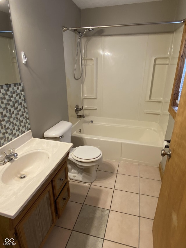 3170 Sapphire Blvd, Indianapolis, IN 46268 - bathroom featuring vanity, tile patterned floors, shower / tub combination, and tasteful backsplash