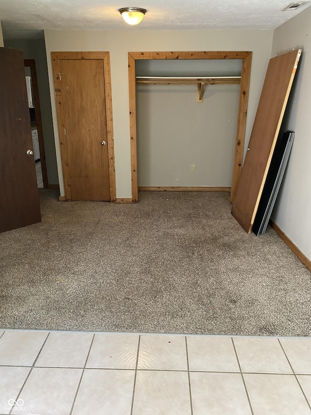 3170 Sapphire Blvd, Indianapolis, IN 46268 - unfurnished bedroom featuring light carpet and a closet