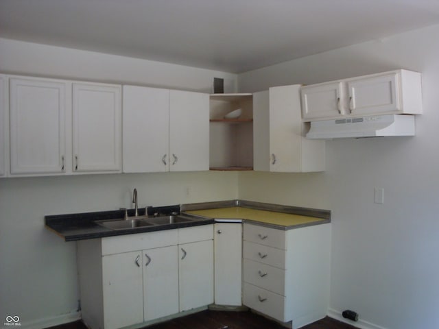 3448 Georgetown Rd, Indianapolis, IN 46224 - kitchen featuring under cabinet range hood, white cabinets, open shelves, and dark wood-style floors