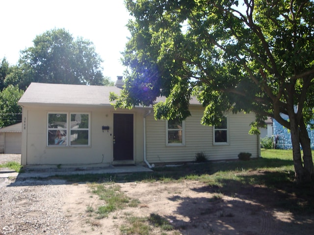 3448 Georgetown Rd, Indianapolis, IN 46224 - view of front of home with a chimney and a garage