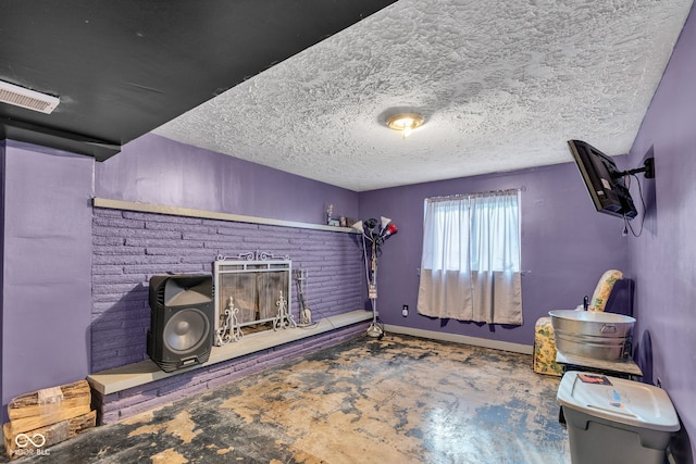 3909 Richelieu Ct, Indianapolis, IN 46226 - miscellaneous room with a textured ceiling and baseboards