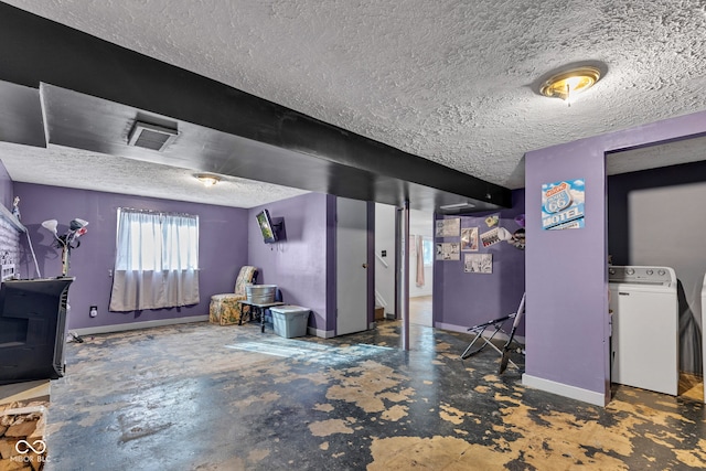 3909 Richelieu Ct, Indianapolis, IN 46226 - basement featuring washer / clothes dryer and a textured ceiling