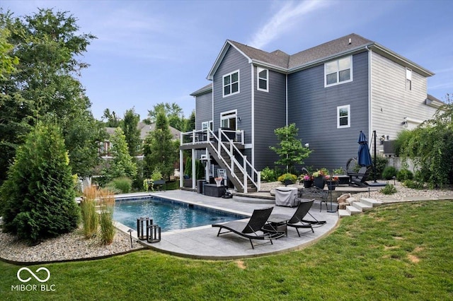 11322 Sea Side Ct, Fishers, IN 46040 - rear view of house with stairway, a patio, a yard, an outdoor pool, and a wooden deck