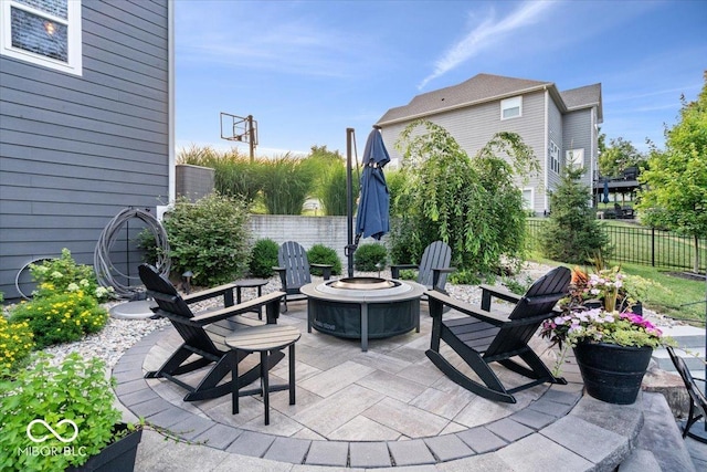 11322 Sea Side Ct, Fishers, IN 46040 - fenced backyard with an outdoor fire pit and a patio area