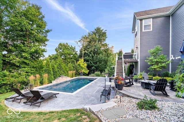 11322 Sea Side Ct, Fishers, IN 46040 - swimming pool with a fire pit, stairway, a patio, and a wooden deck