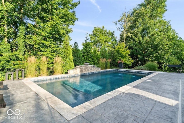 11322 Sea Side Ct, Fishers, IN 46040 - swimming pool with a patio area
