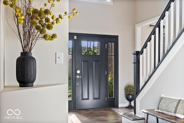 11322 Sea Side Ct, Fishers, IN 46040 - foyer entrance featuring wood finished floors, stairway, and a high ceiling