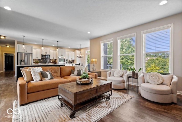 11322 Sea Side Ct, Fishers, IN 46040 - living area featuring wood finished floors and recessed lighting