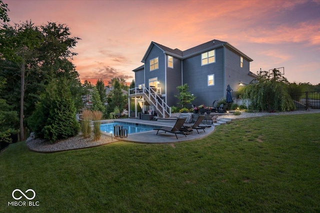 11322 Sea Side Ct, Fishers, IN 46040 - rear view of property with stairs, a patio area, and an outdoor pool