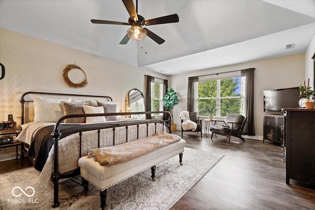 11322 Sea Side Ct, Fishers, IN 46040 - bedroom with wood finished floors and a ceiling fan