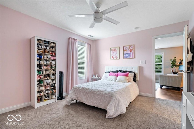 11322 Sea Side Ct, Fishers, IN 46040 - carpeted bedroom featuring baseboards and a ceiling fan