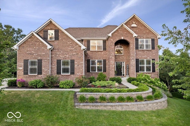 11322 Sea Side Ct, Fishers, IN 46040 - traditional-style home with a front yard and brick siding